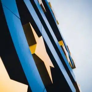 blue and yellow building under blue sky during daytime